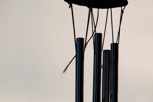 minimal wind chime with soft natural light creating a calm, quiet home atmosphere